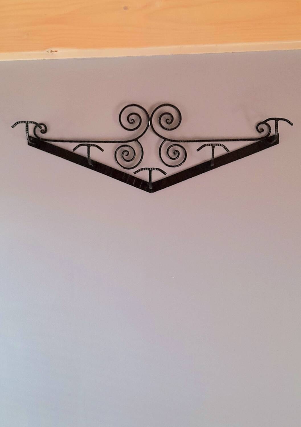 Art Deco wrought iron coat rack.