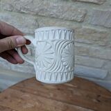 Old terracotta mug with glazed interior