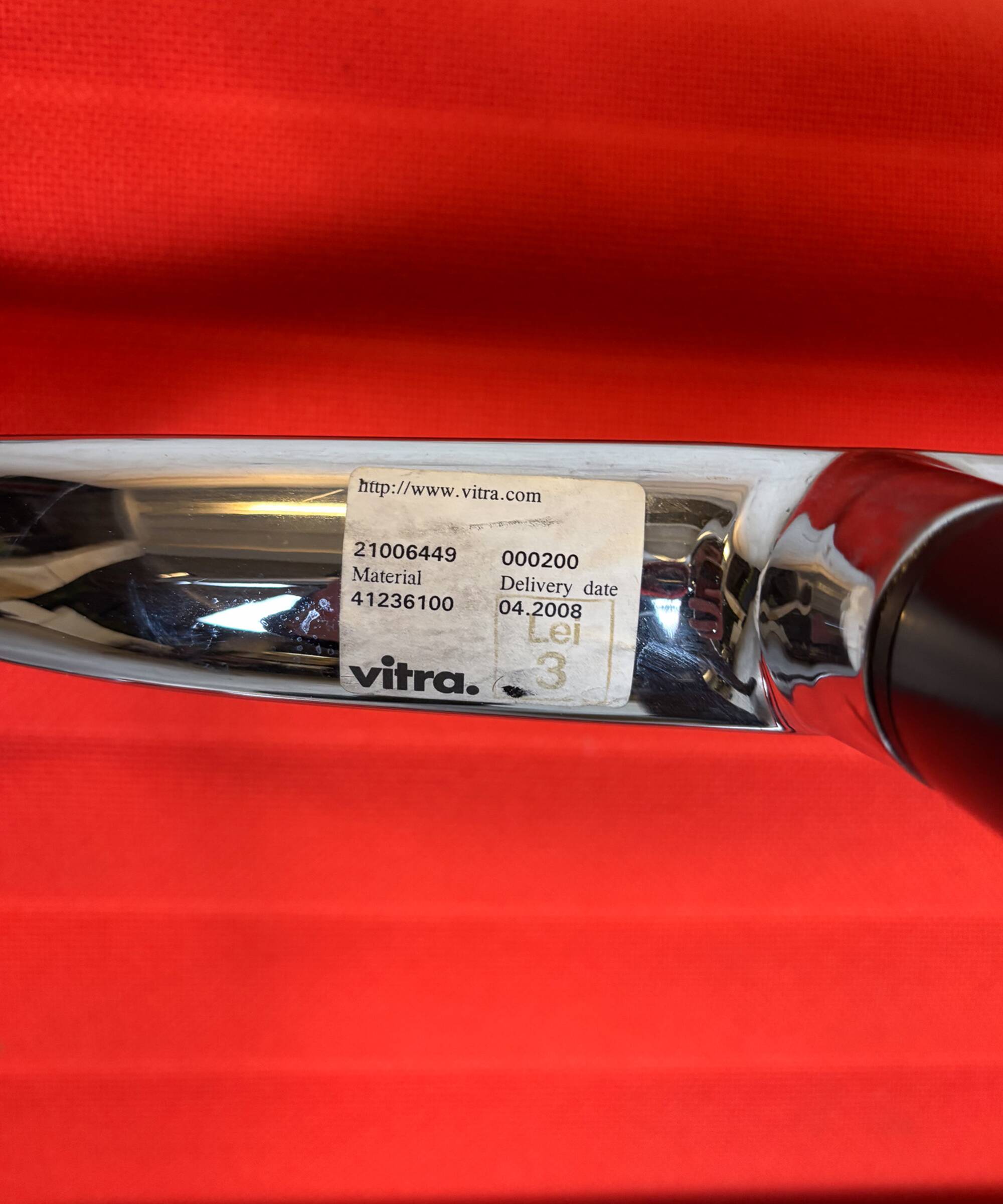 Vitra EA 108 Charles & Ray Eames, tissu et aluminium – orange – chaise de t