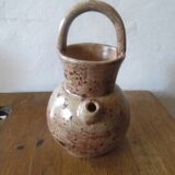 Pitcher in sandstone