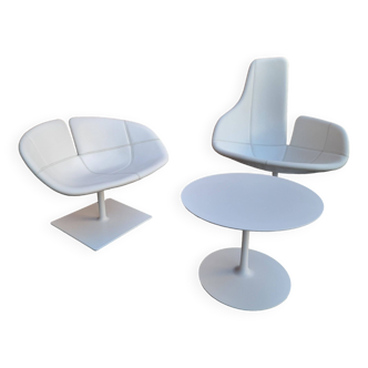 two designer armchairs