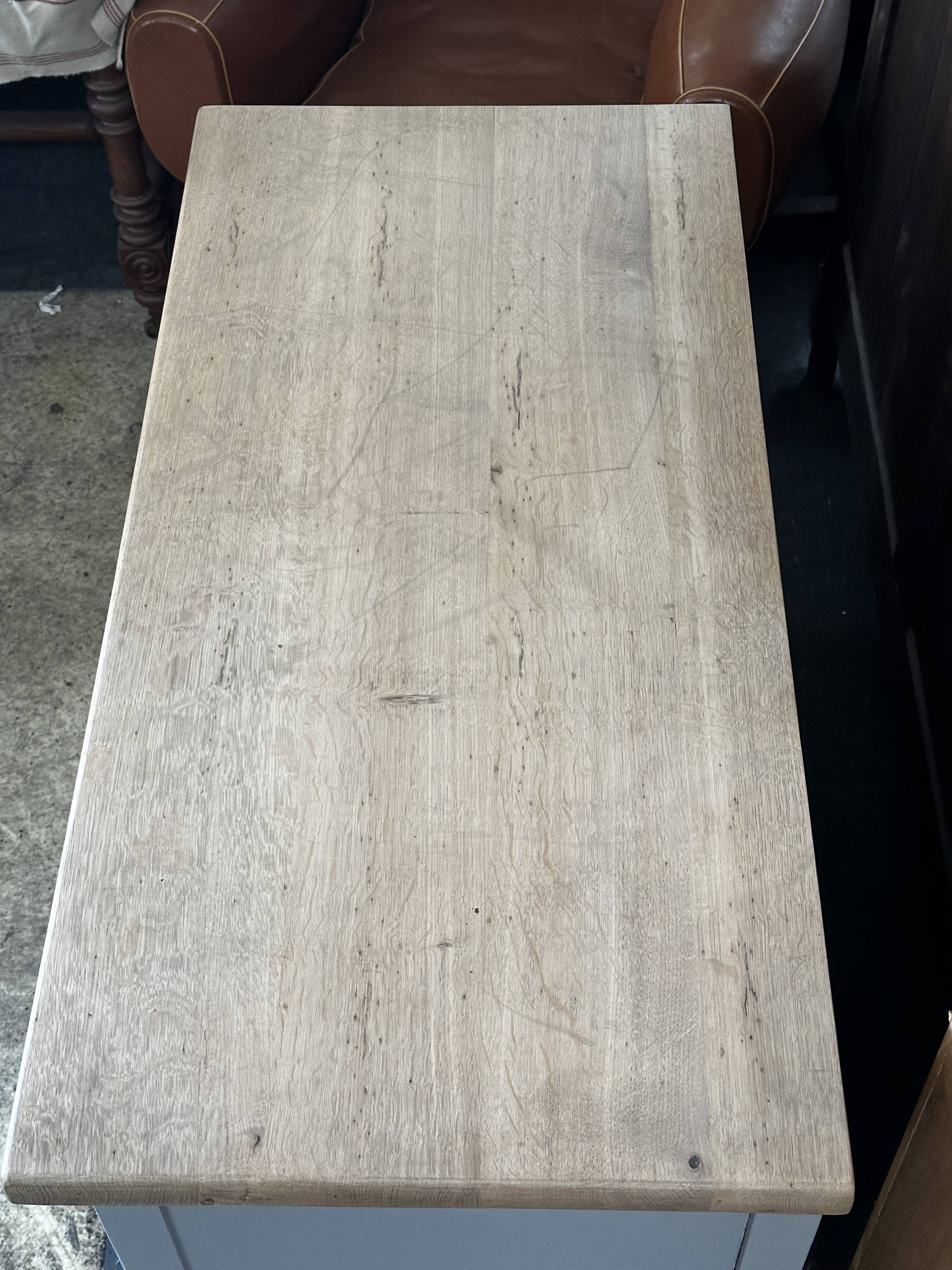 Vintage sideboard painted in gray and raw wood