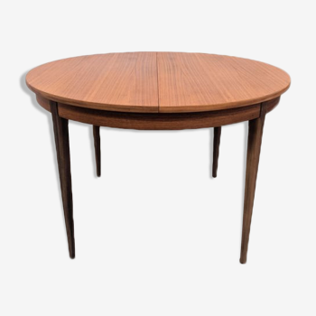 Teak dining table with butterfly extension