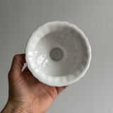 Small white ceramic flowerpot or bowl on foot