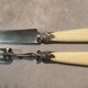 Silver/ivory leg service