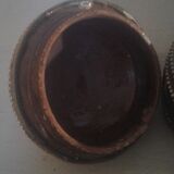 Ancient box in ceramic and enamel surrounded by brass