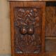 Victorian carved oak revolving library, circa 1880.