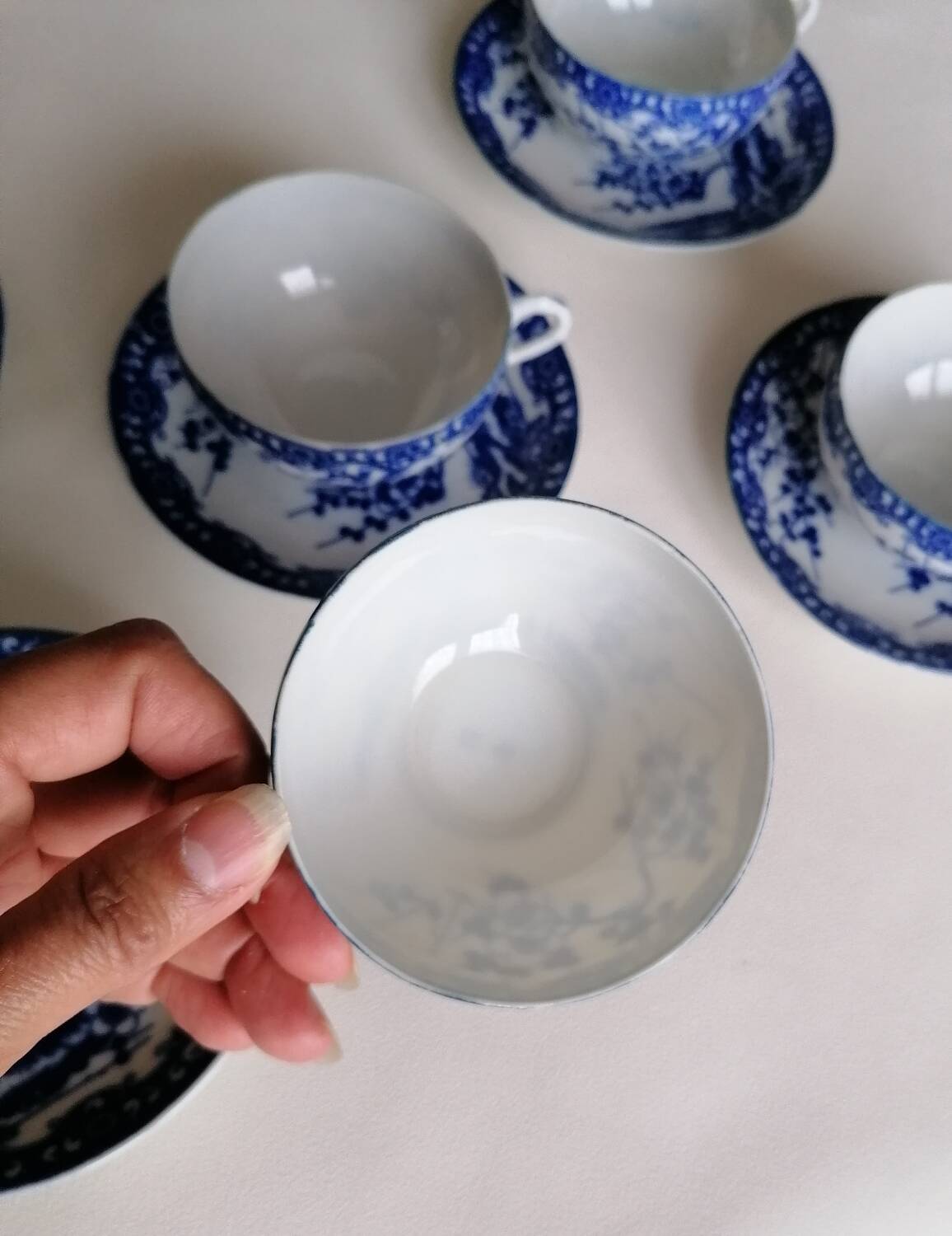 5 white and blue Japanese porcelain tea cups