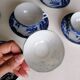 5 white and blue Japanese porcelain tea cups