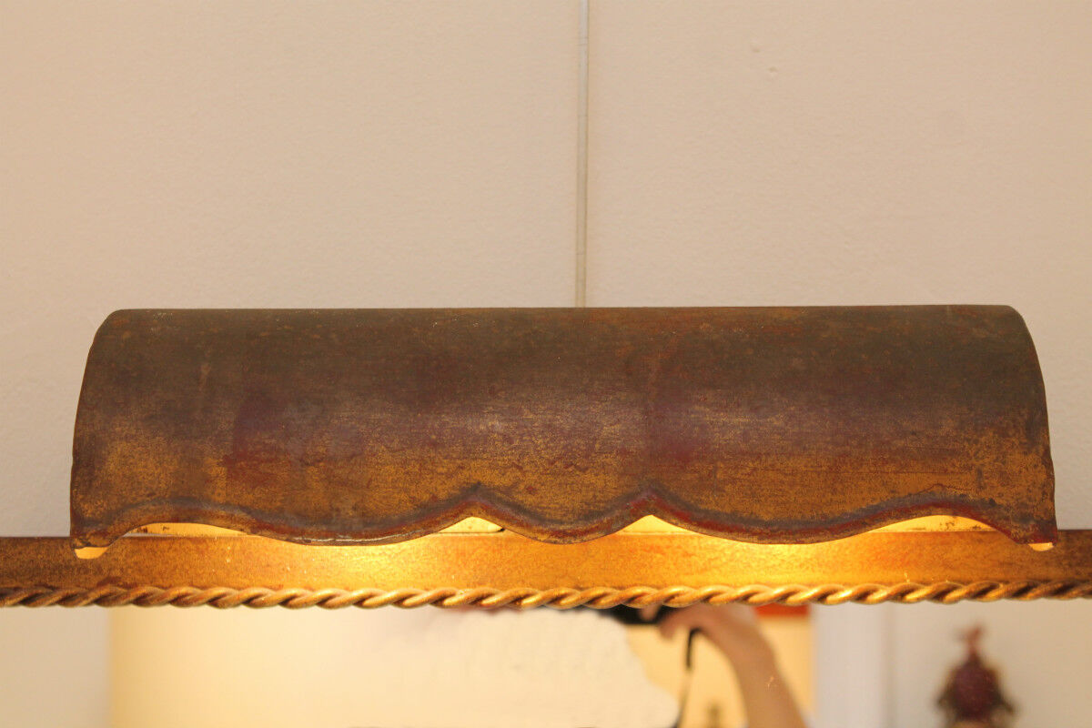 Mirror lighting in gilded wrought iron