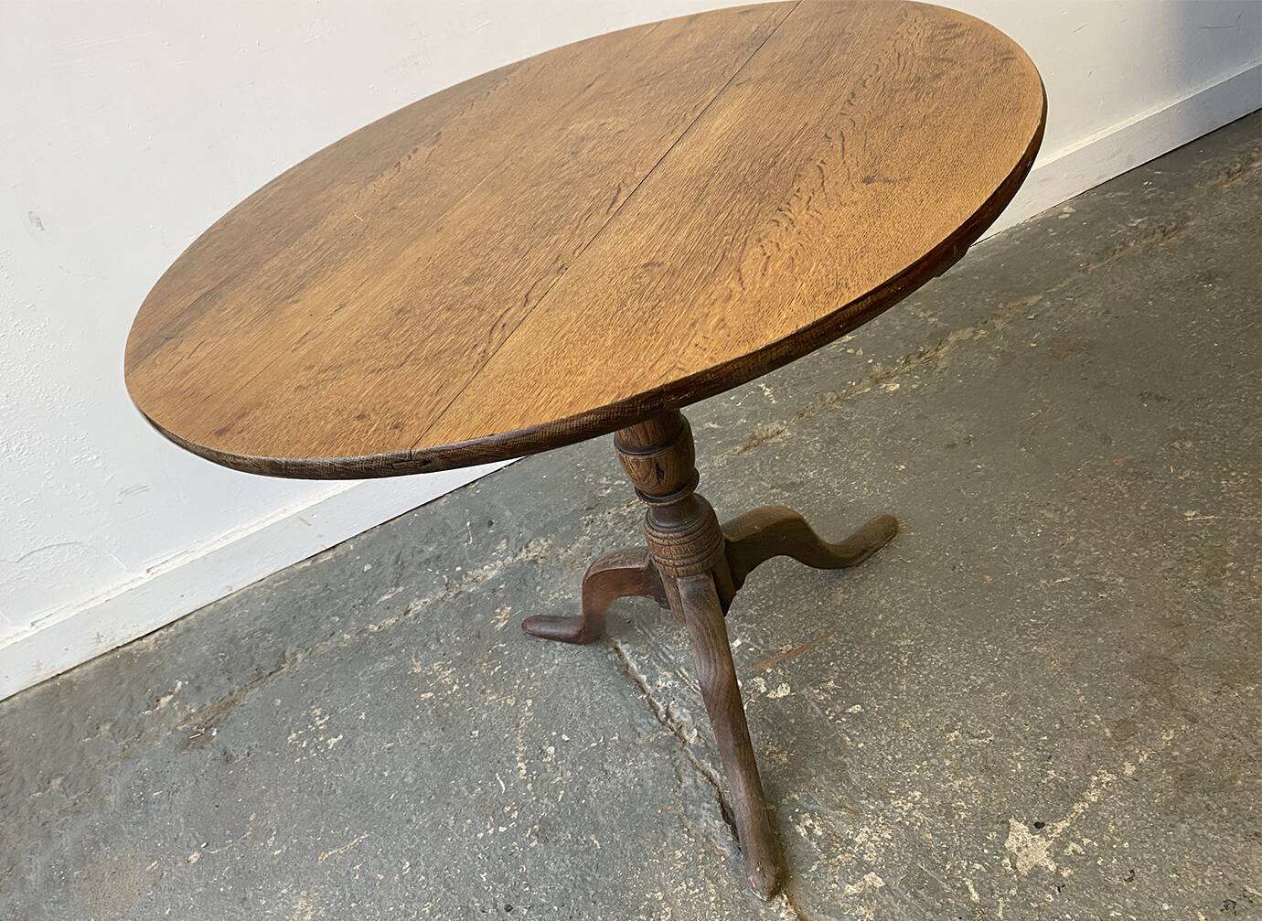 19th century antique oak round tilt top table