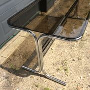 Dining table of the 70s in smoked glass and chromed metal