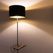 Black metal magazine rack floor lamp with ceramic shelf