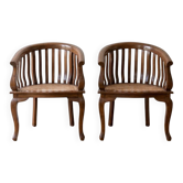 Pair of antique wooden and caned armchairs
