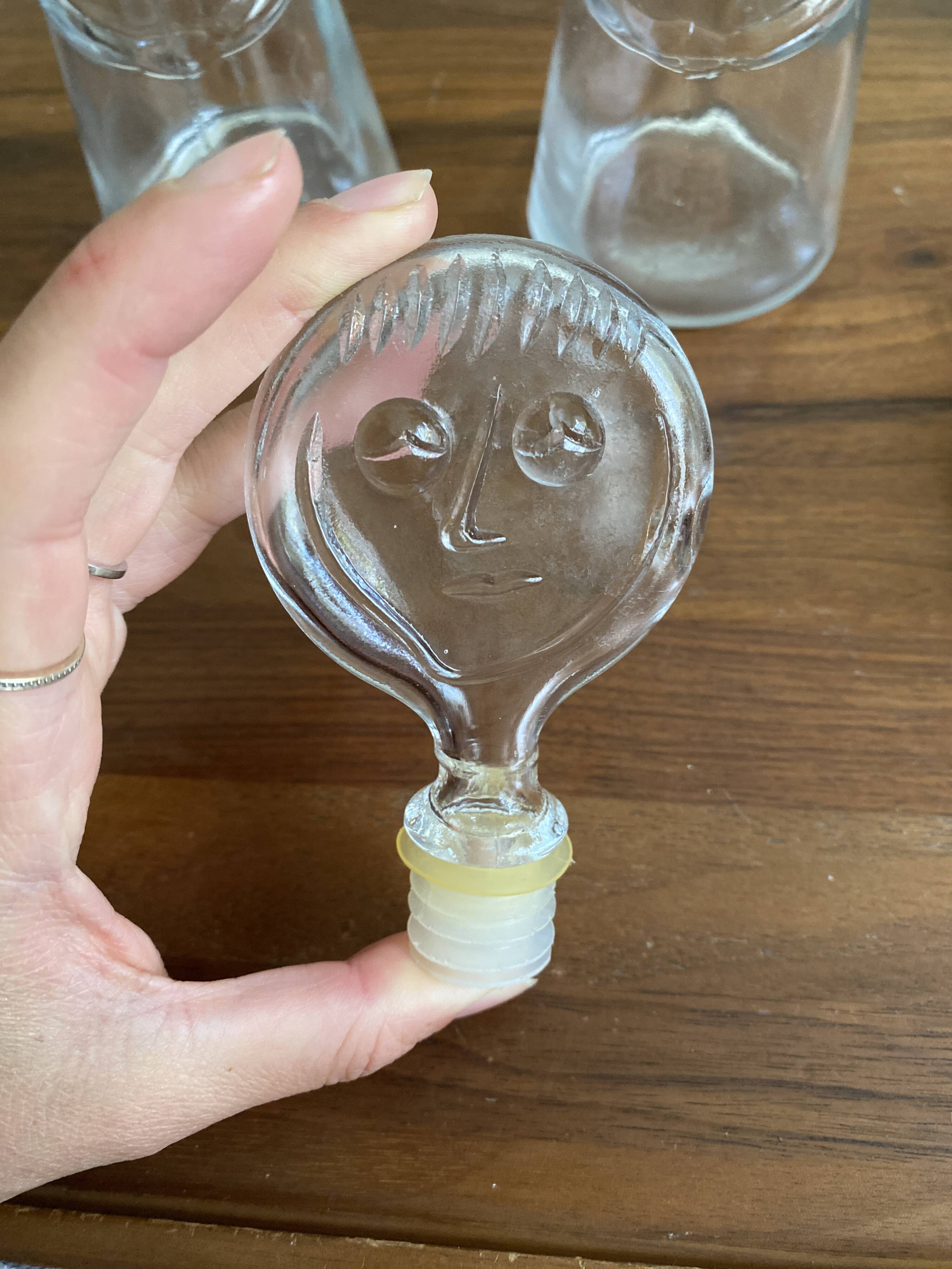 Pair of decanters by Erik Hoglund for Neiman Marcus, "People" series, Kosta Boda