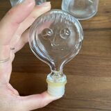 Pair of decanters by Erik Hoglund for Neiman Marcus, "People" series, Kosta Boda