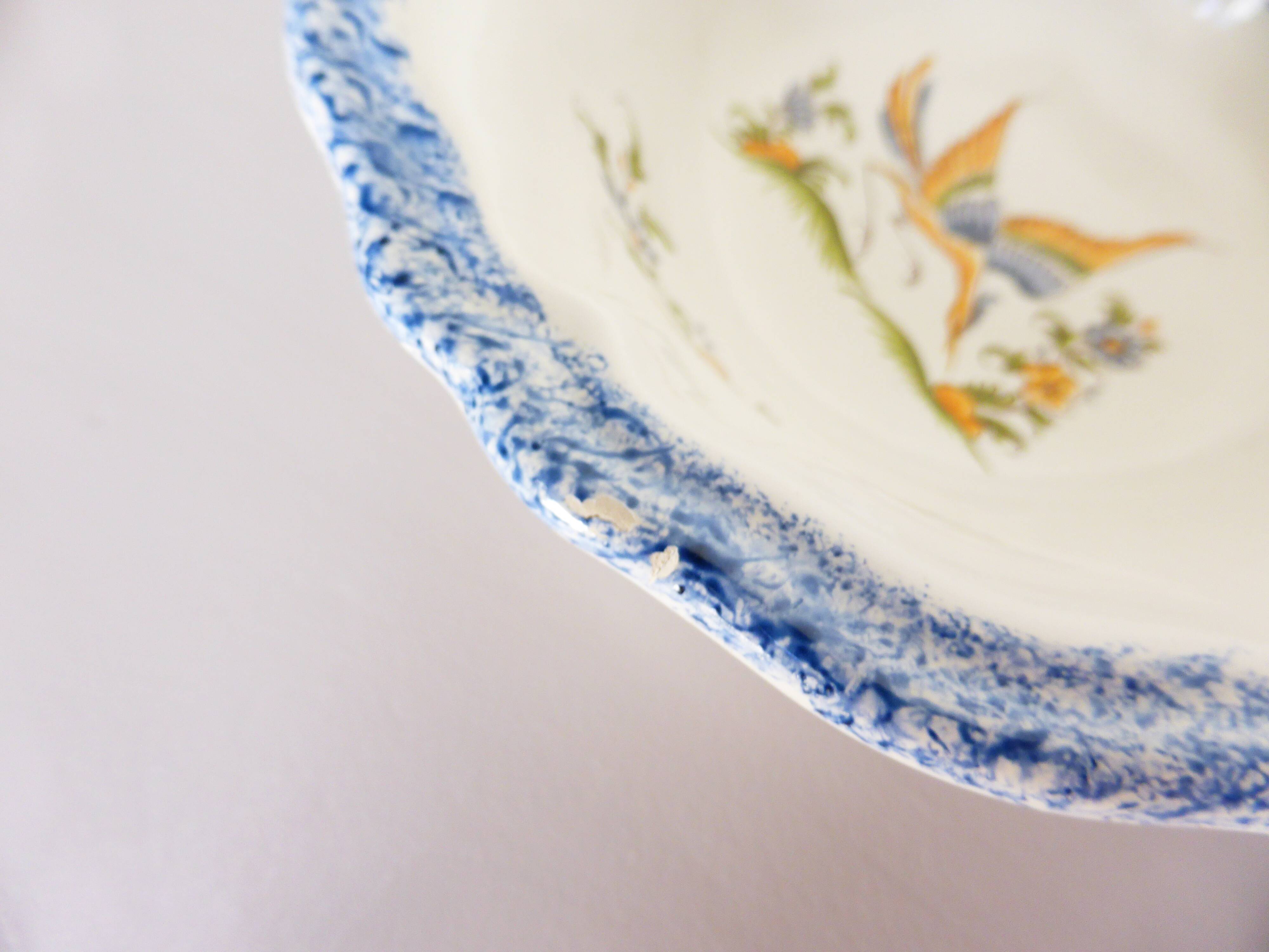 Empty pocket dish from the French pottery, Moustier model 2008149.