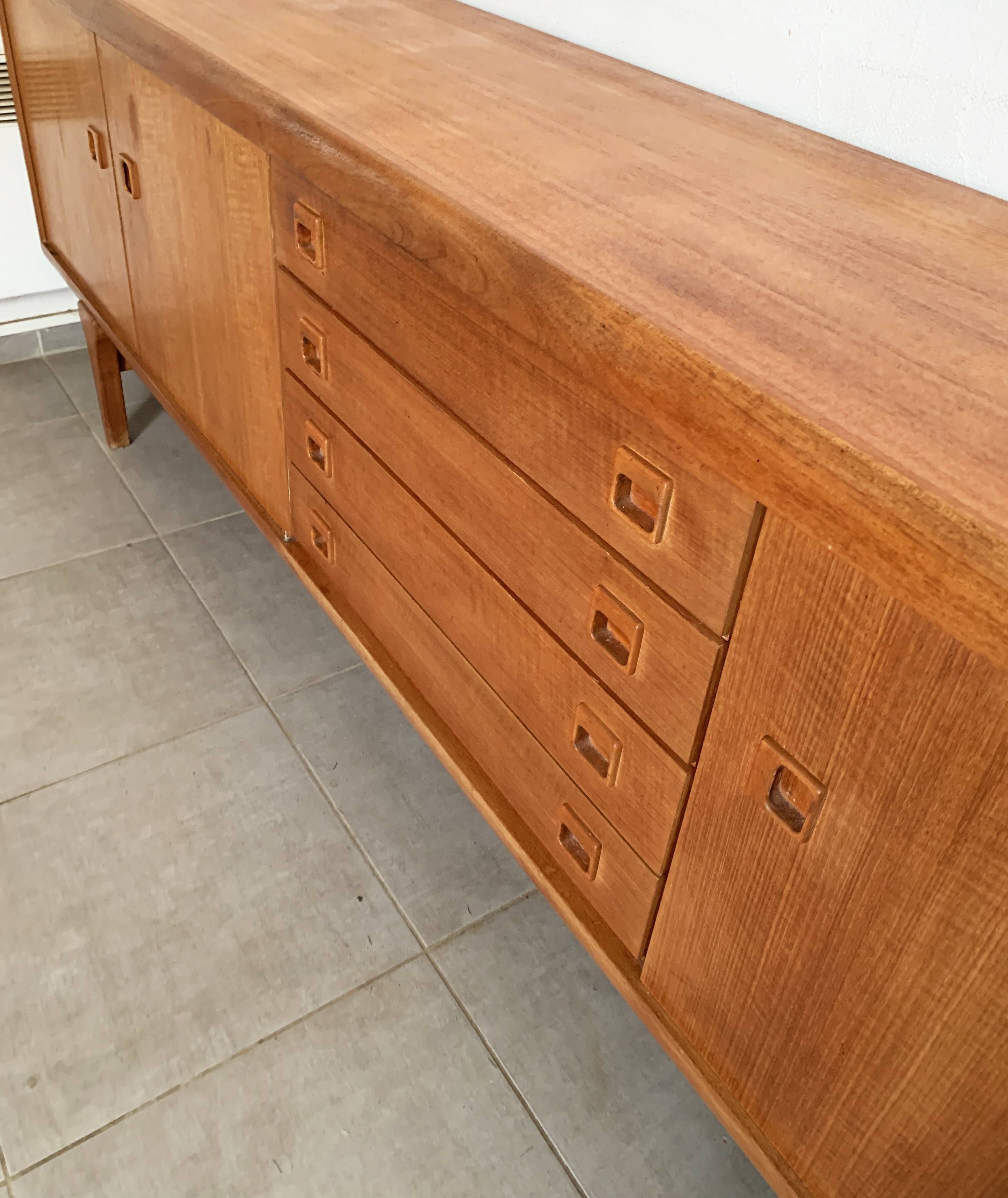 Large Danish vintage row in blond teak from the 60s