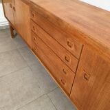Large Danish vintage row in blond teak from the 60s