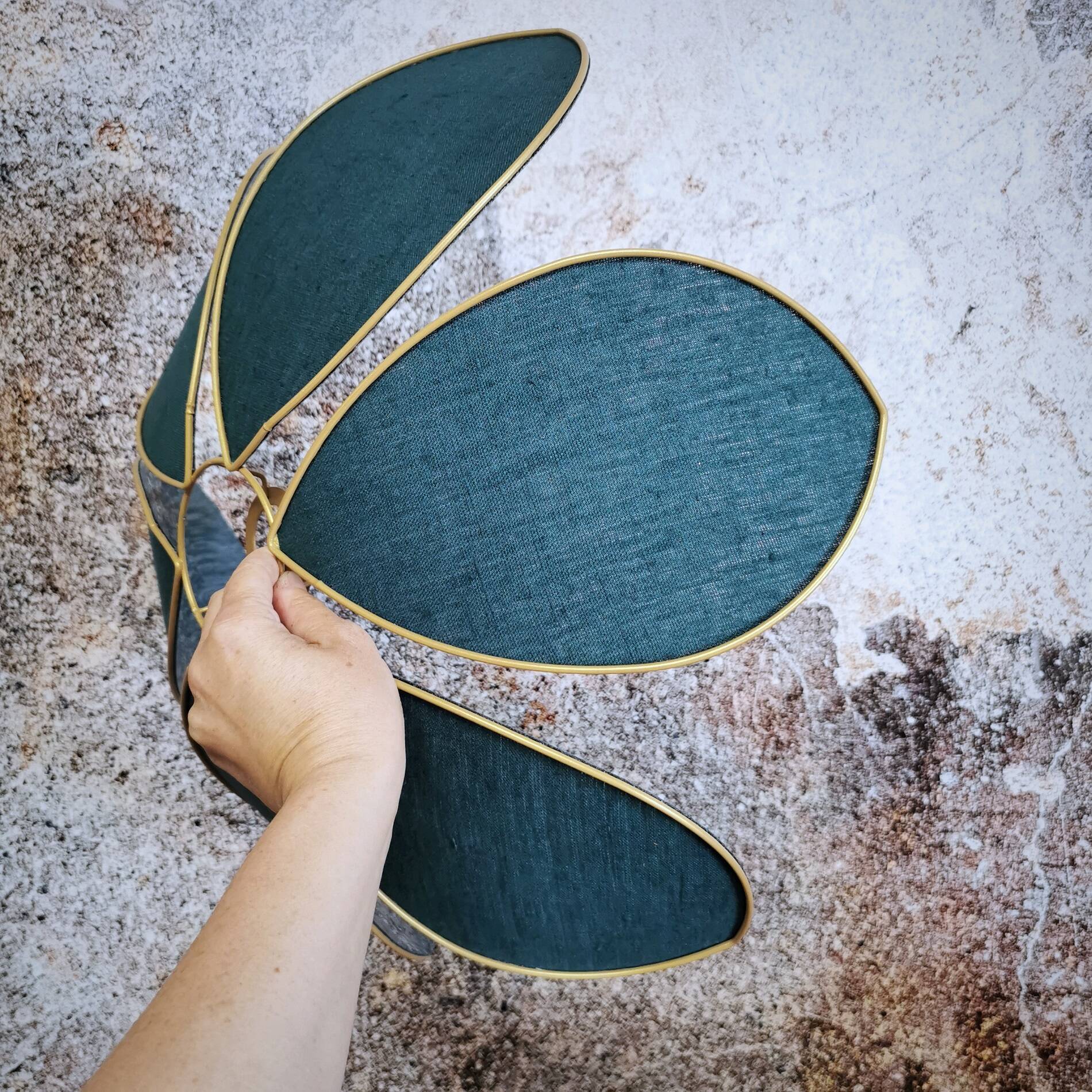 Flower suspension with metal structure and peacock blue linen petals