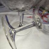 Beautiful set of seven crystal champagne glasses engraved with vine branches