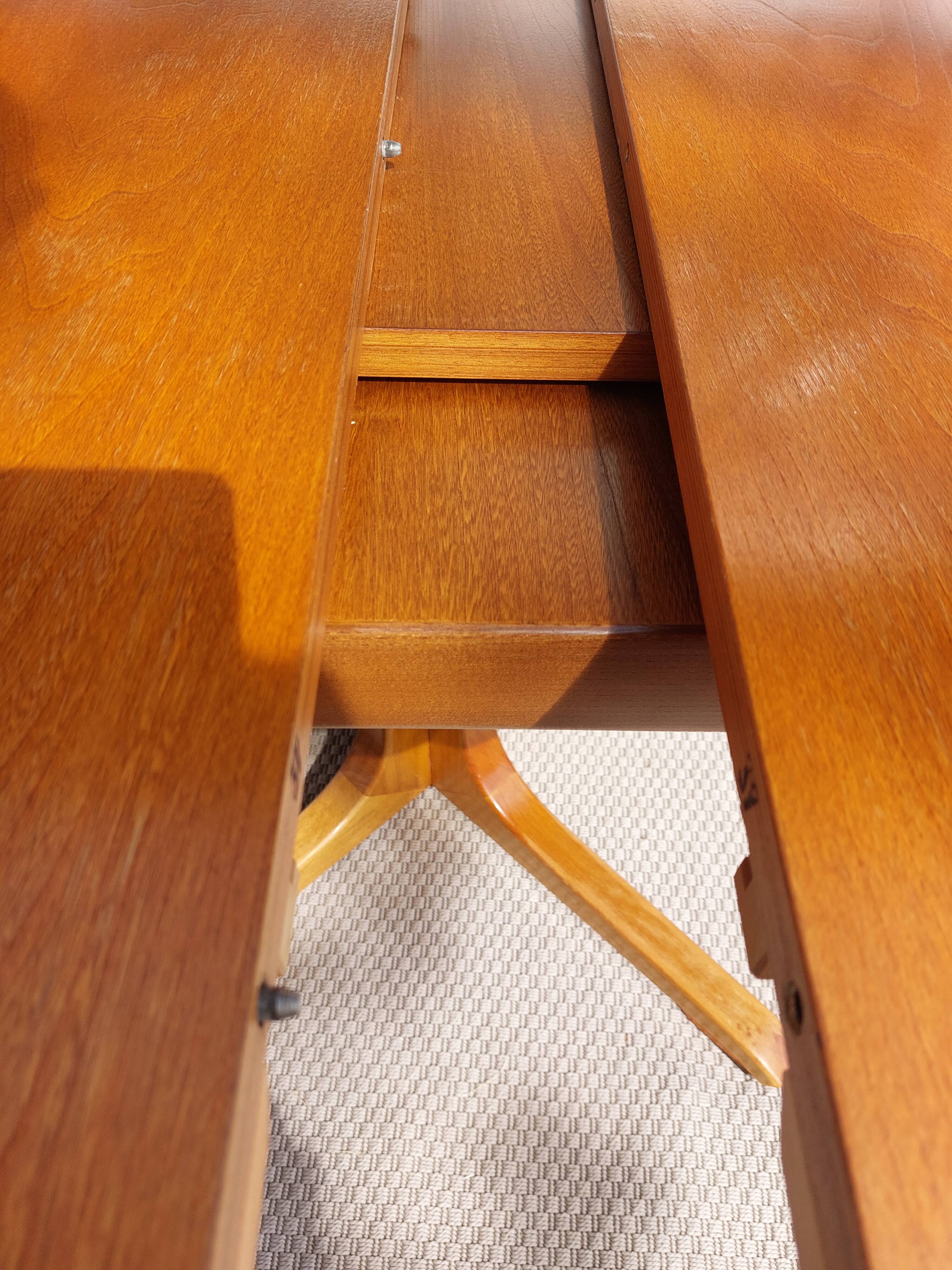 round or oval table with extension, central leg, vintage Baumann design