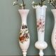 Set of 3 vintage vases/soliflores in white opaline with floral decorations.