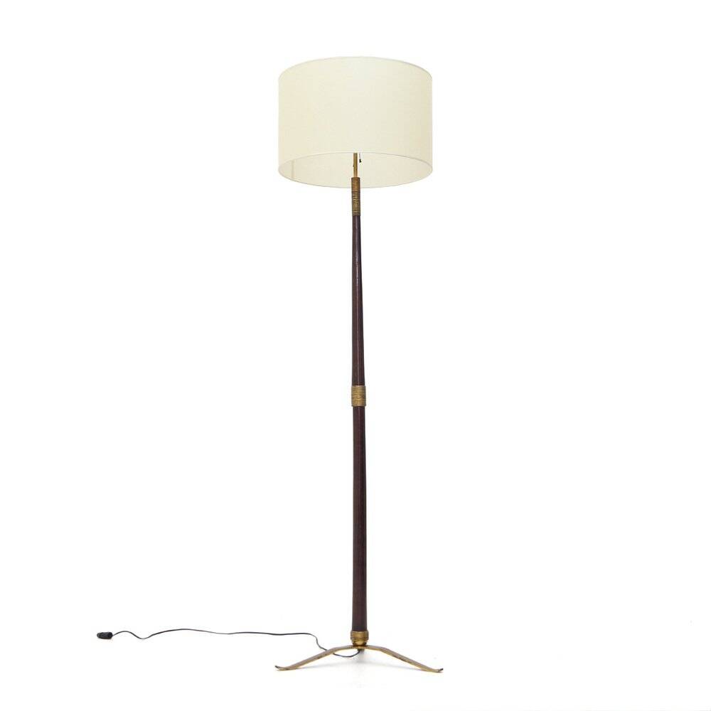 Floor lamp with a brass base and parchment shade, 1940s.