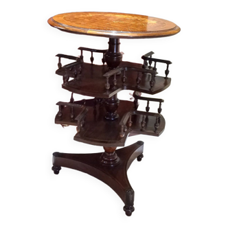 English rotating bookcase in marquetry of several wood species with floral decorations