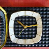 Vintage formica clock rectangular silent wall pendulum "Trophy black reliefs"