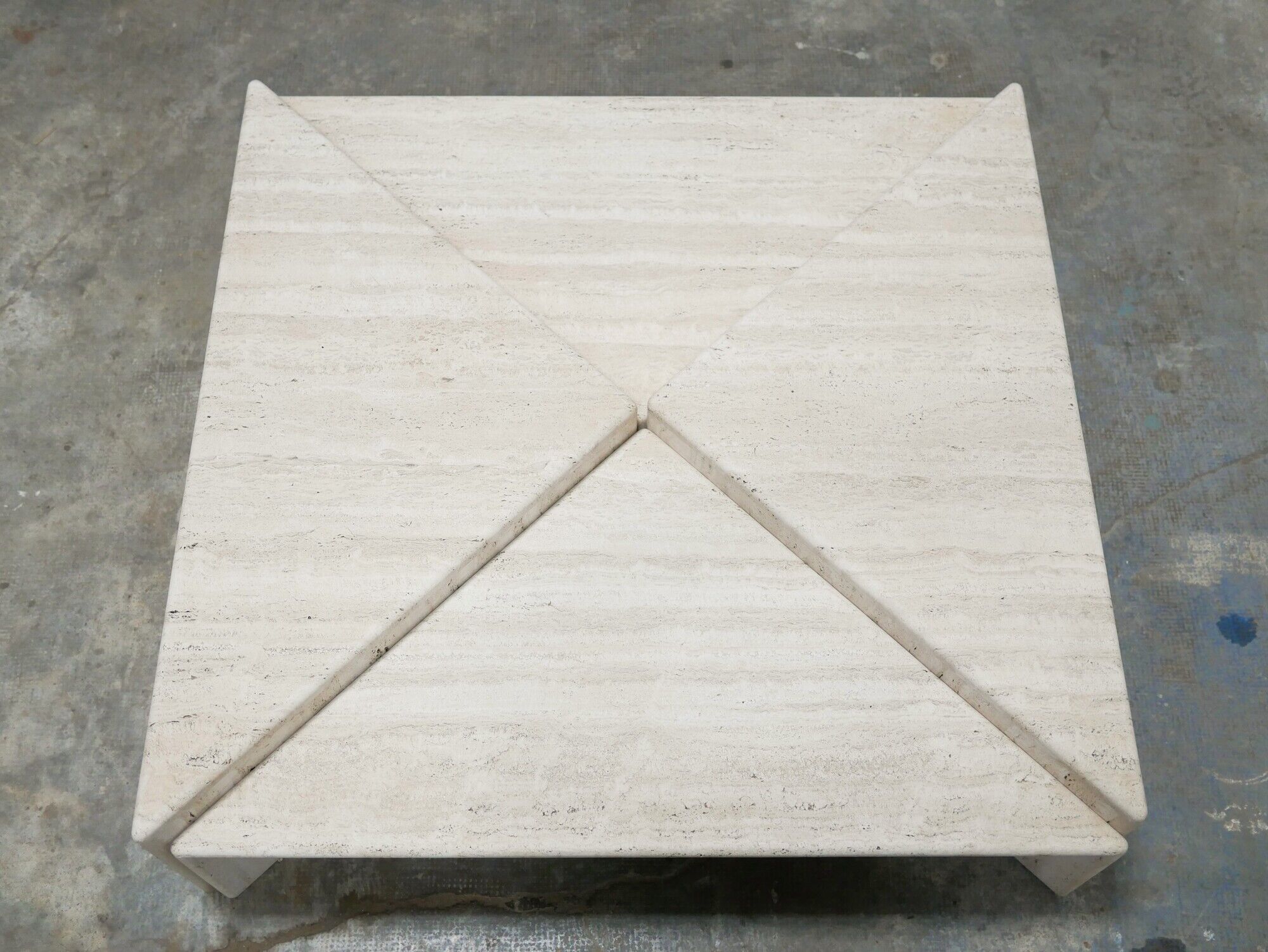 Series of 2 vintage travertine coffee tables published by Roche Bobois