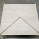 Series of 2 vintage travertine coffee tables published by Roche Bobois