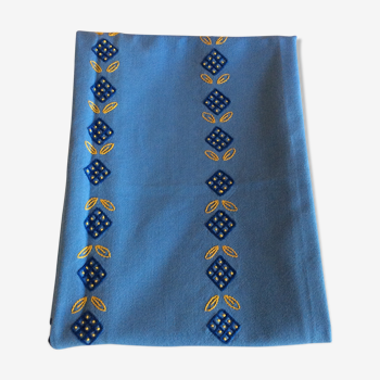 Old blue tablecloth with hand embroidery