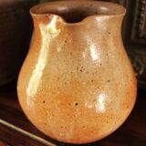 Vintage stoneware pitcher with spout handle