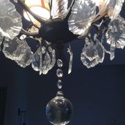 Antique chandelier with tassels
