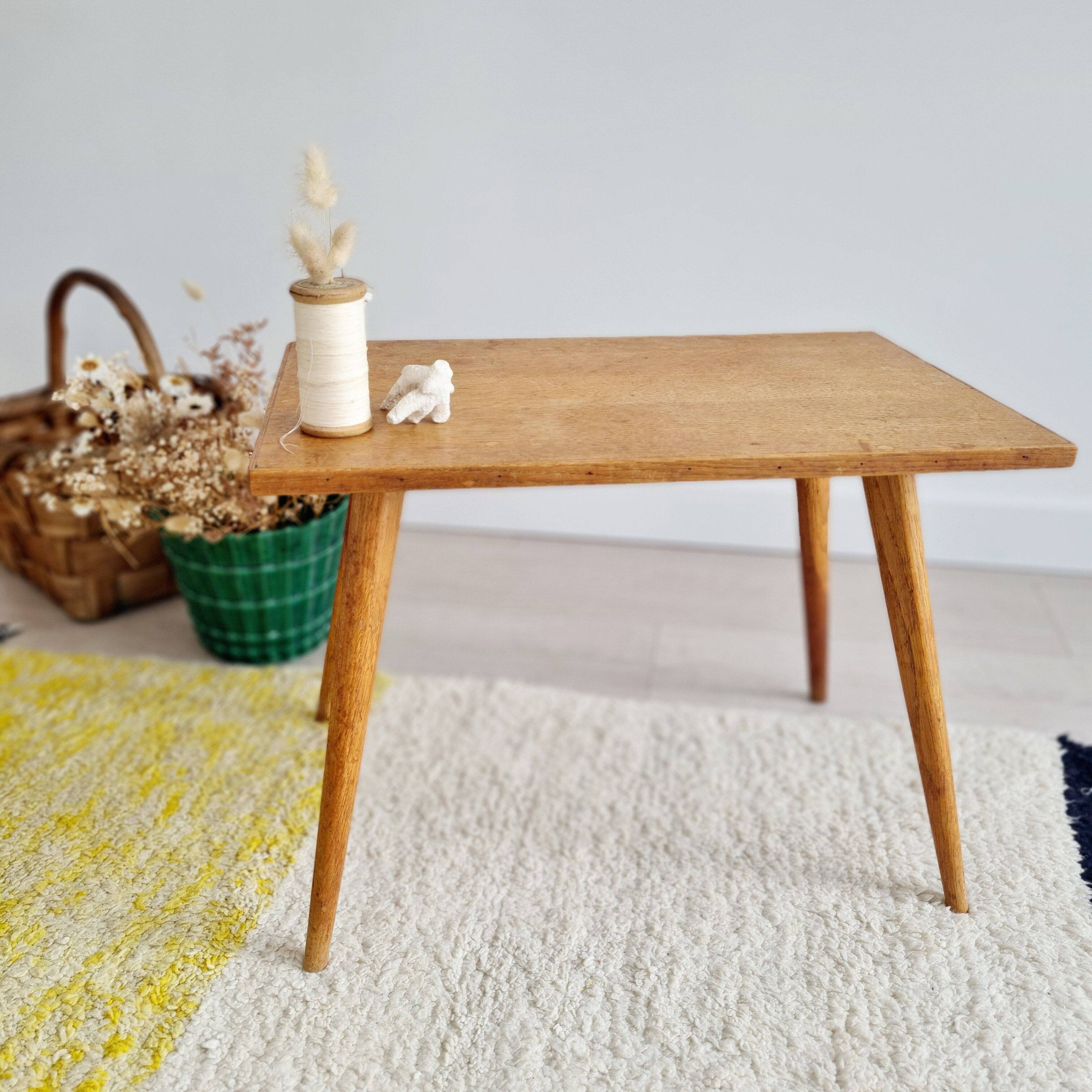 Antique coffee table with compass legs
