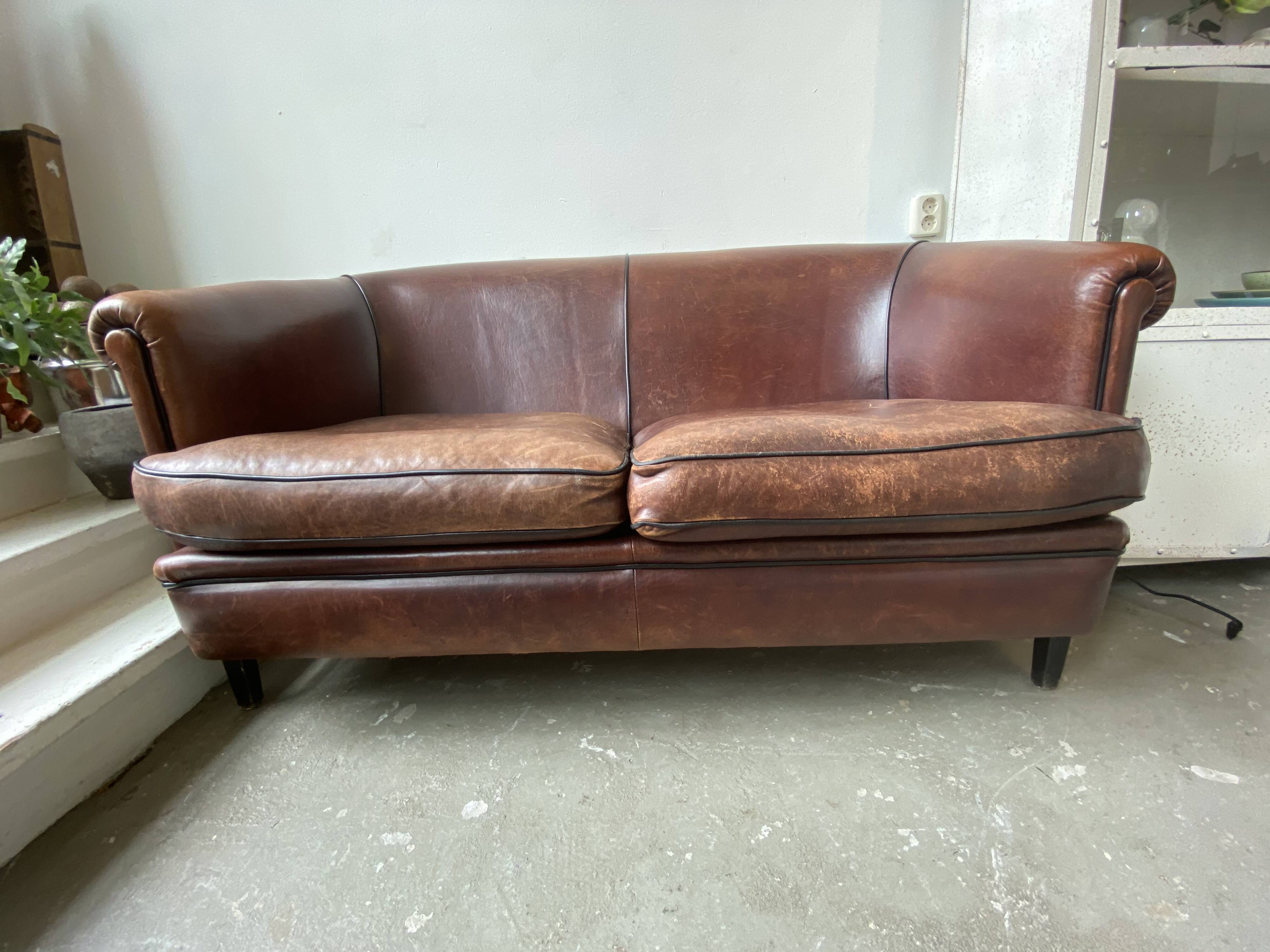 Canapé deux places vintage en cuir