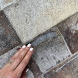 Leather carpets with rectangular geometric patterns