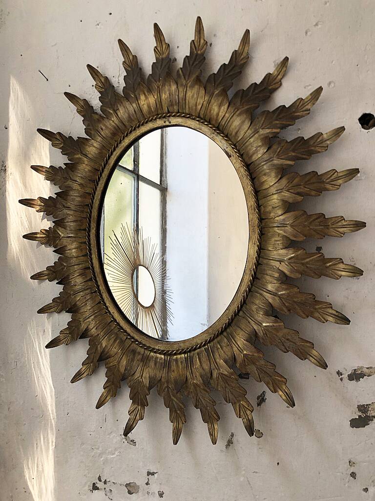 Old flowered sun golden mirror