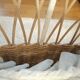 Rattan and wrought iron cradle