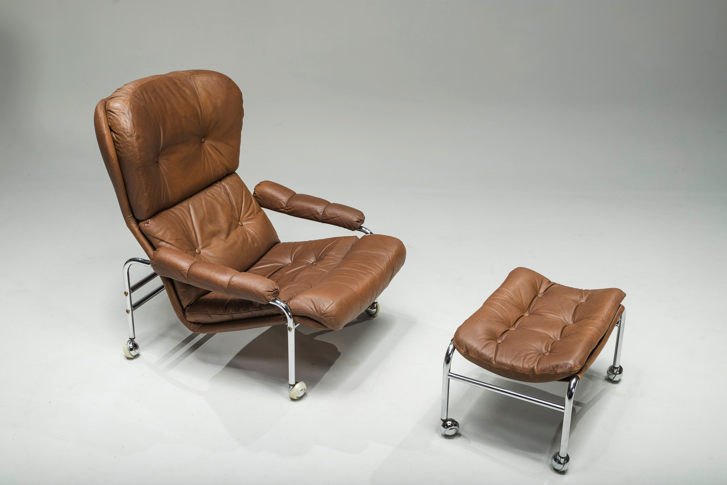 Swedish Lounge Chair and Ottoman in Chrome and Brown Leather by Scapa Rydaholm, 1960s, Set of 2