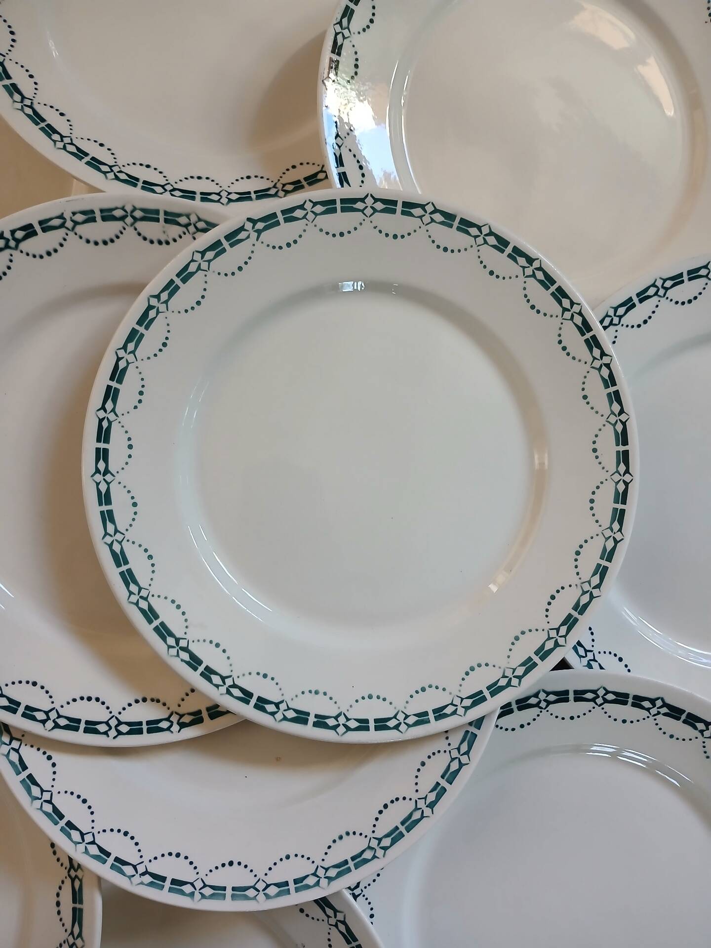 12 flat plates in ironstone from Badonviller