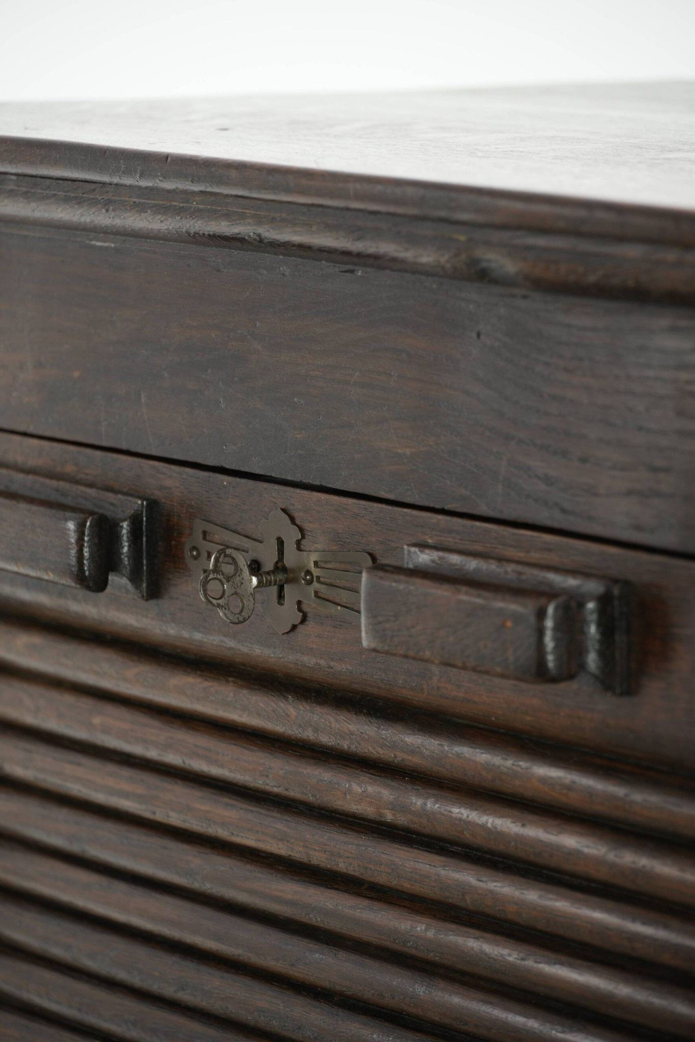 English antique archive cabinet with oak roll-up door from the 20th century