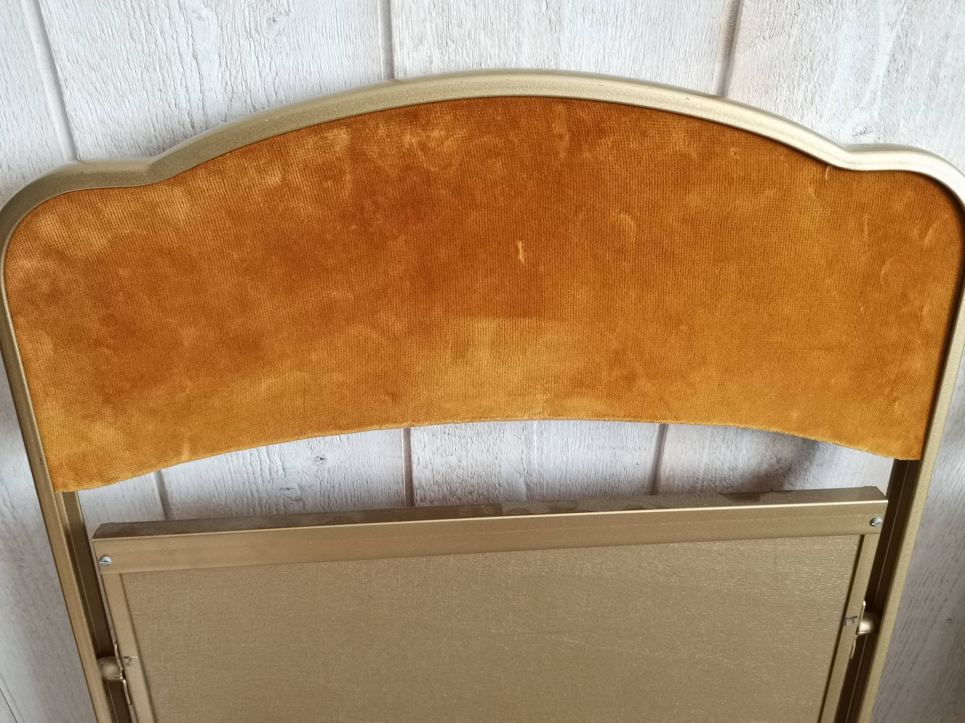 Two gold velvet chairs