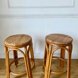 Pair of wicker bar stools and bamboo cane