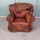 Leather nailed armchair