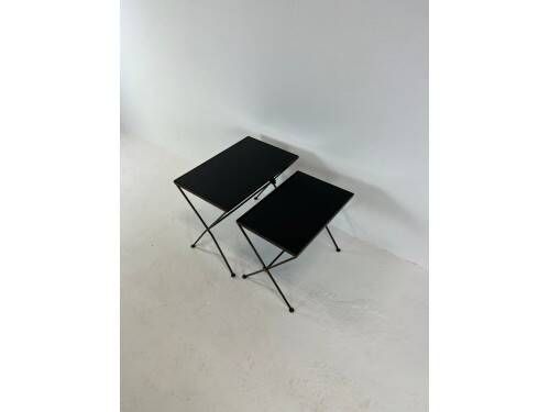 Modernist nesting tables in metal and black glass, 1950s.