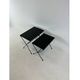 Modernist nesting tables in metal and black glass, 1950s.
