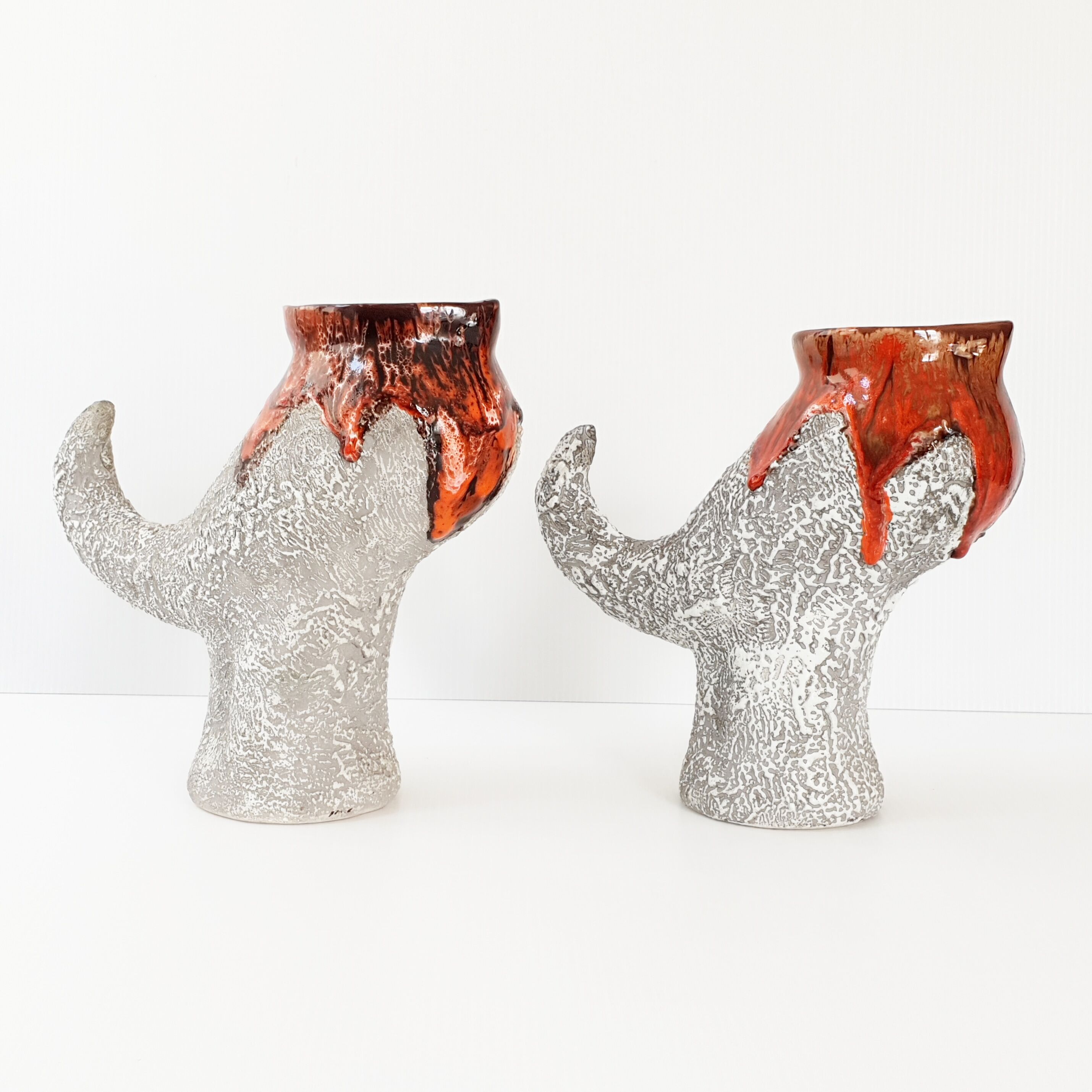 Pair of vintage zoomorphic pitchers