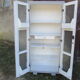 50s kitchen cabinet transformed with a patina makeover